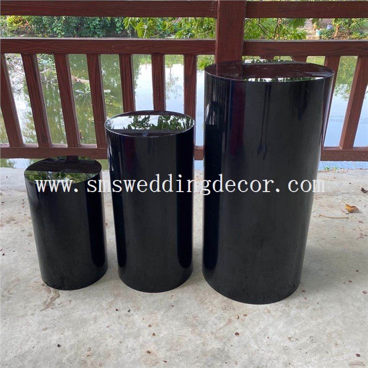 black cylinder table